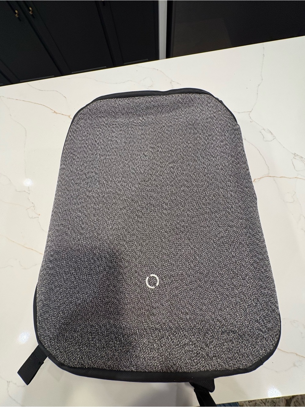 Sleek Men's Gray Minimalist Backpack with Subtle Ring Accent